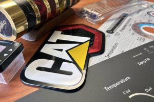 Les produits comprennent des articles IMD et IMSE, des interrupteurs à membrane, des plaques signalétiques métalliques, des produits et des étiquettes en forme de dôme.